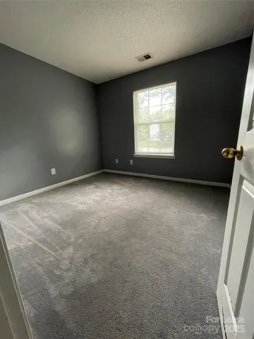 a bathroom with a sink a toilet and a shower