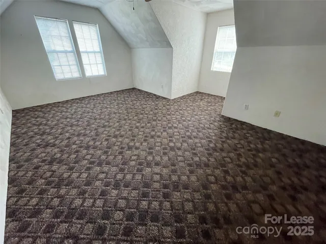 a view of a patio with a yard