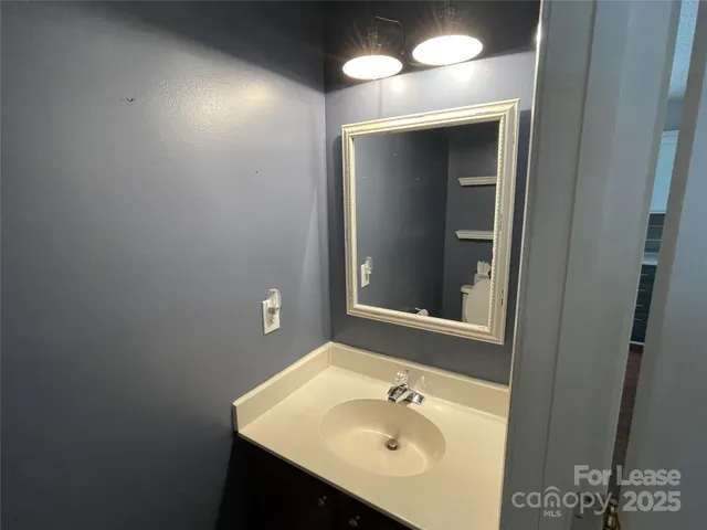 a view of entryway with stairs and wooden floor