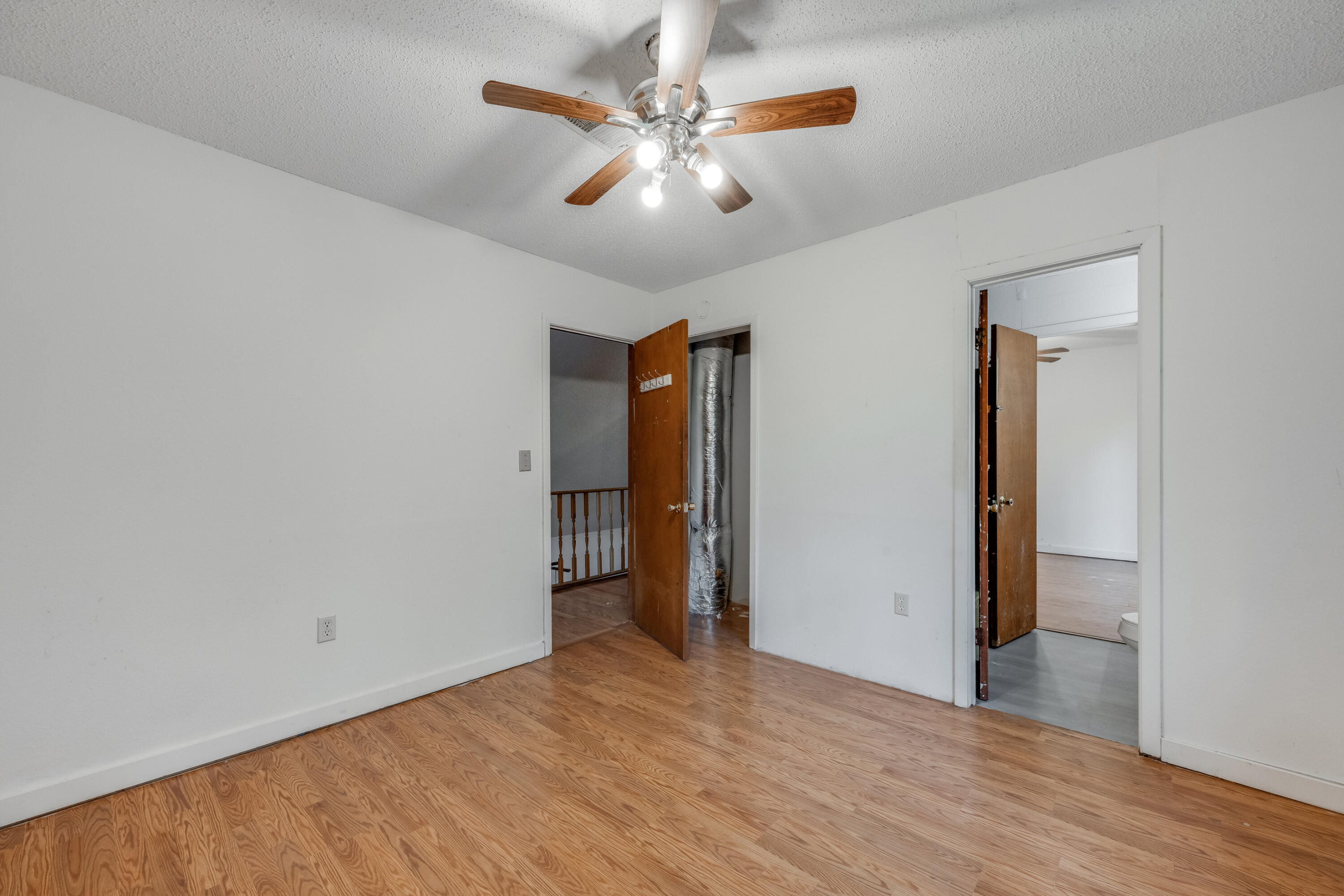 4157 Sundance Way Holt, FL 32564 - Photo 24 of 30 an empty room with closet and a ceiling fan