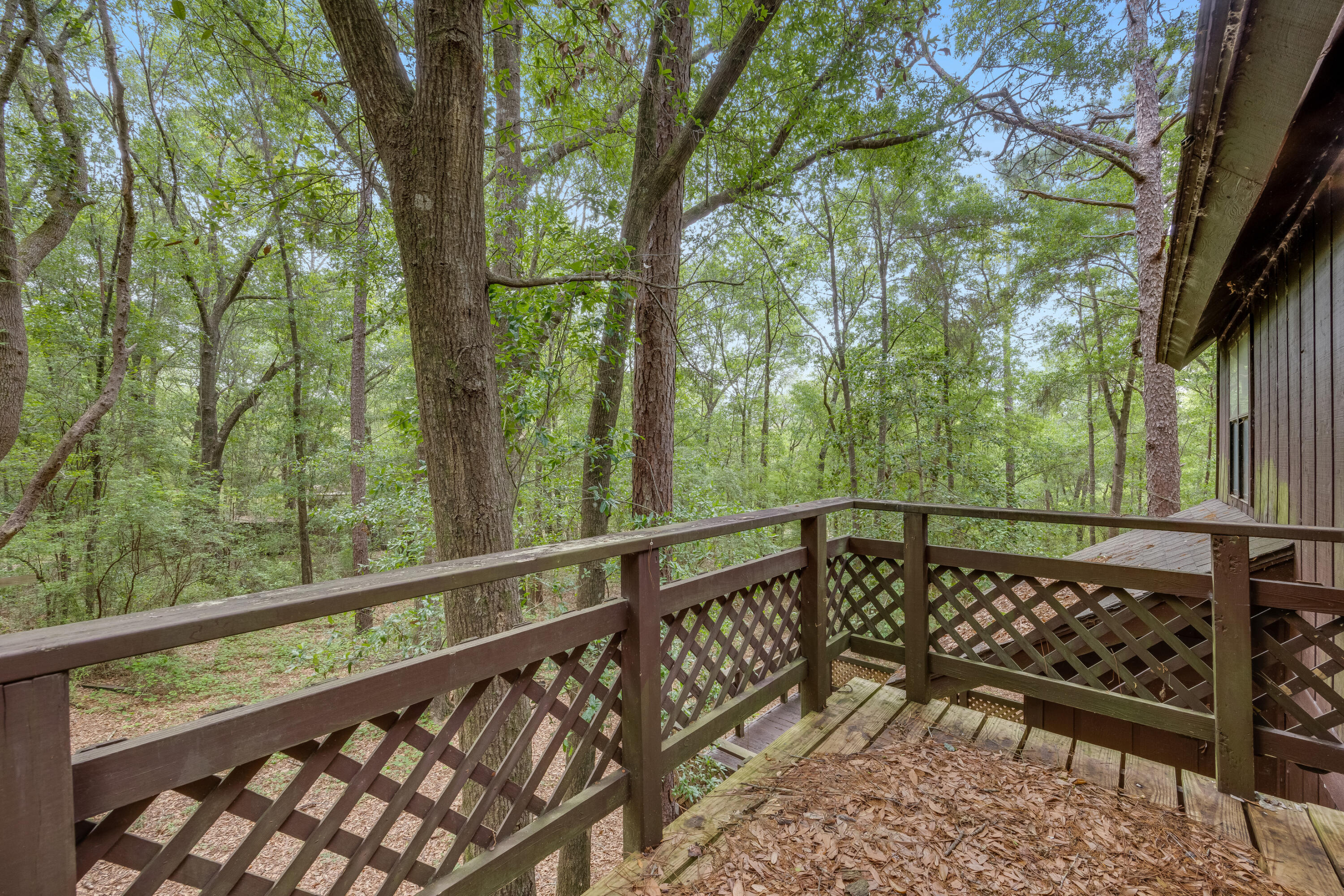 4157 Sundance Way Holt, FL 32564 - Photo 27 of 30 a view of a two chairs and table in the balcony
