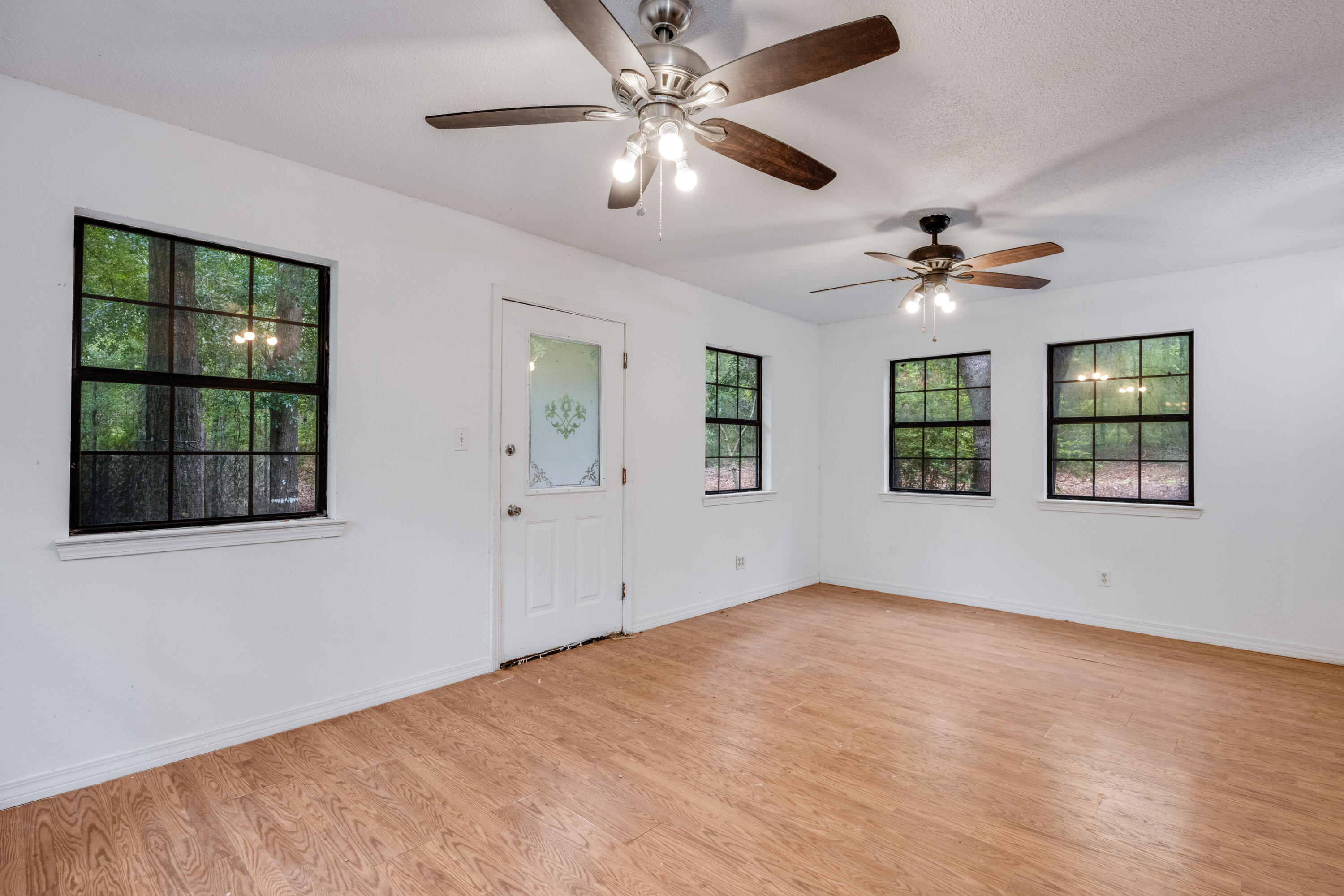 4157 Sundance Way Holt, FL 32564 - Photo 3 of 30 a view of an empty room with a window