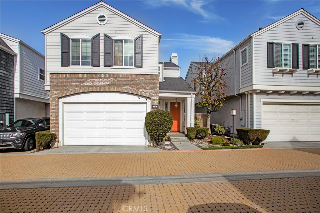306 Canoe Pond Costa Mesa, CA 92627 - Photo 1 of 1 a front view of a house with sitting area