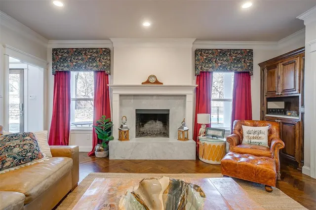 a living room with furniture and a rug