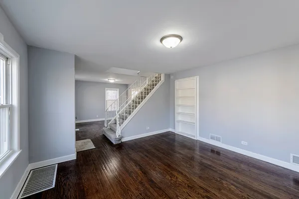 a view of entryway with wooden floor