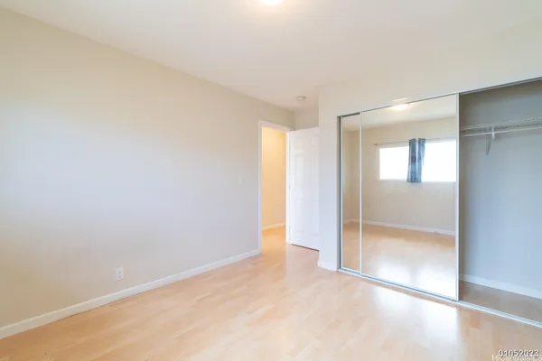 a bathroom with a shower sink and mirror