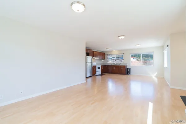 a view of kitchen and living room