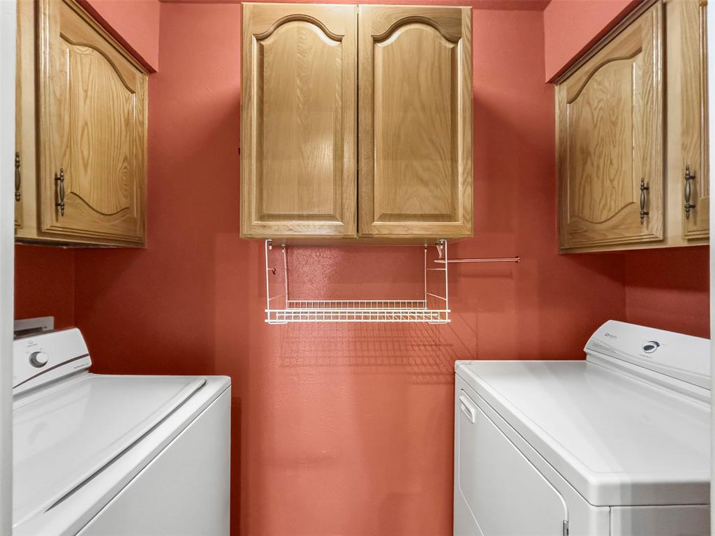 17490 Meandering Way, Unit 404 Dallas, TX 75252 - Photo 12 of 25 a utility room with dryer and washer
