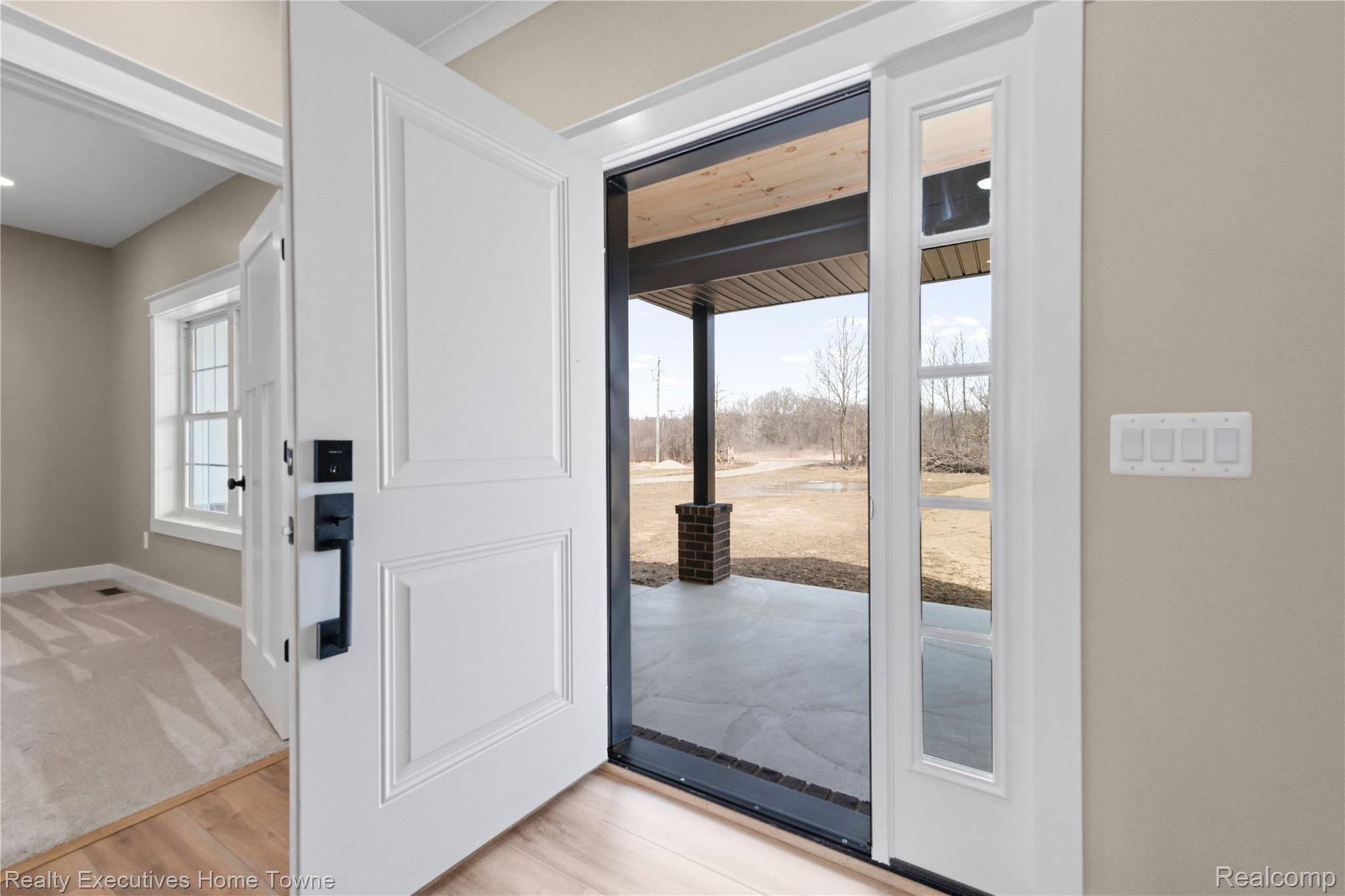 26850 Irwin Road Richmond, MI 48062 - Photo 3 of 47 Doorway with wood finished floors and baseboards