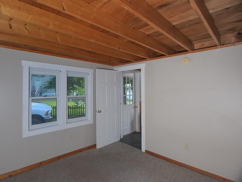 51 Basin Point Road Harpswell, ME 04079 - Photo 14 of 20 1st floor bedroom with open wood...