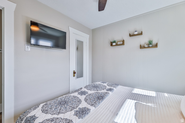 59 East 8680th Street South Sandy, UT 84070 - Photo 10 of 33 Interior space featuring light gray walls and a ceiling fan