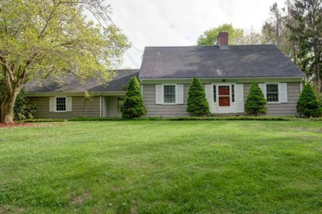 32 Mischa Hill Road Trumbull, CT 06611 - Photo 1 of 1 a front view of house with yard and green space