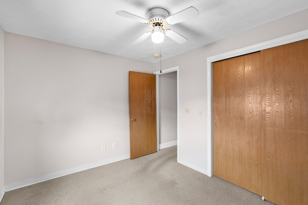 70 North Court Street, Unit F Fall River, MA 02720 - Photo 11 of 20 a view of a livingroom with a chandelier fan