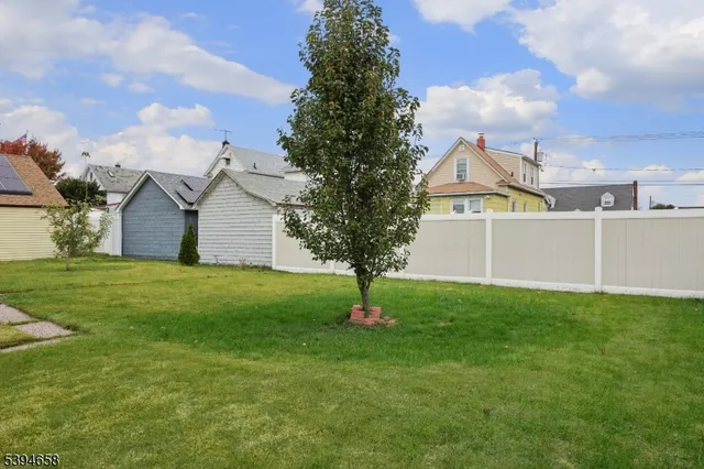 a house view with garden space