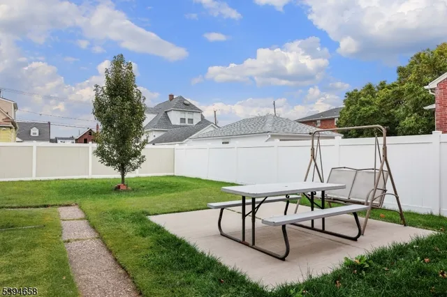 a view of a terrace with sitting area