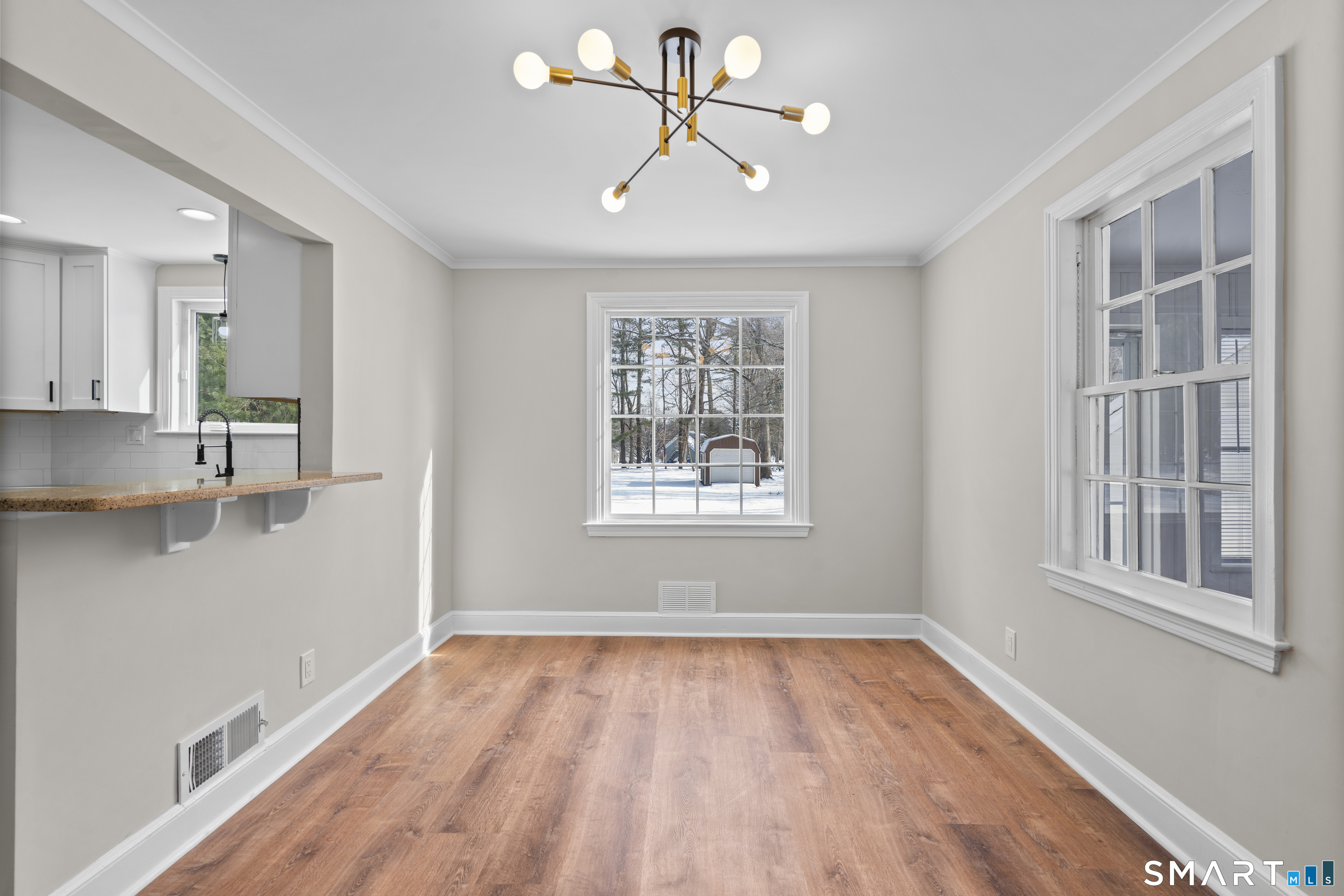 608 Kennedy Road Windsor, CT 06095 - Photo 11 of 39 a view of an empty room with a window