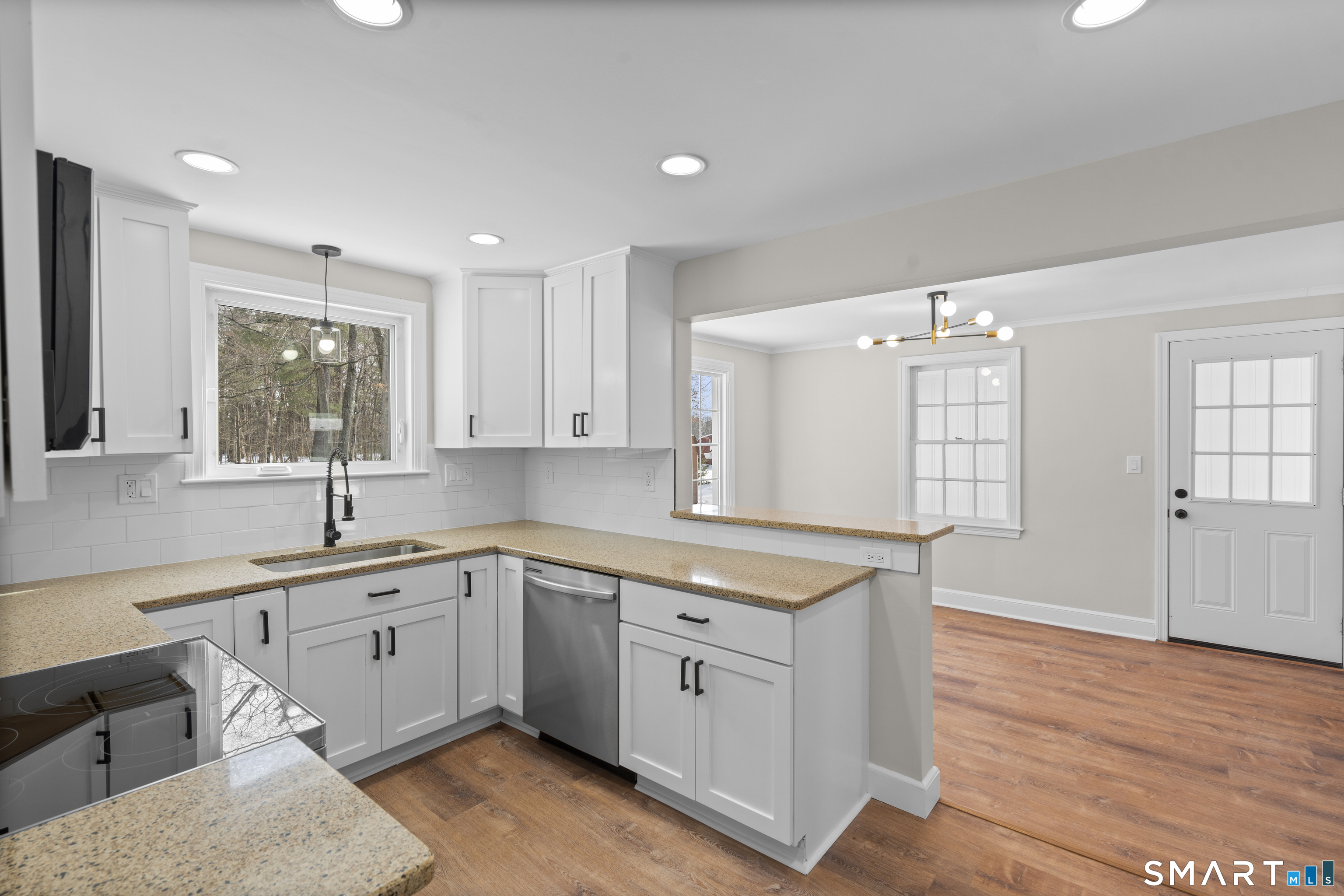608 Kennedy Road Windsor, CT 06095 - Photo 14 of 39 a kitchen with a sink cabinets and window