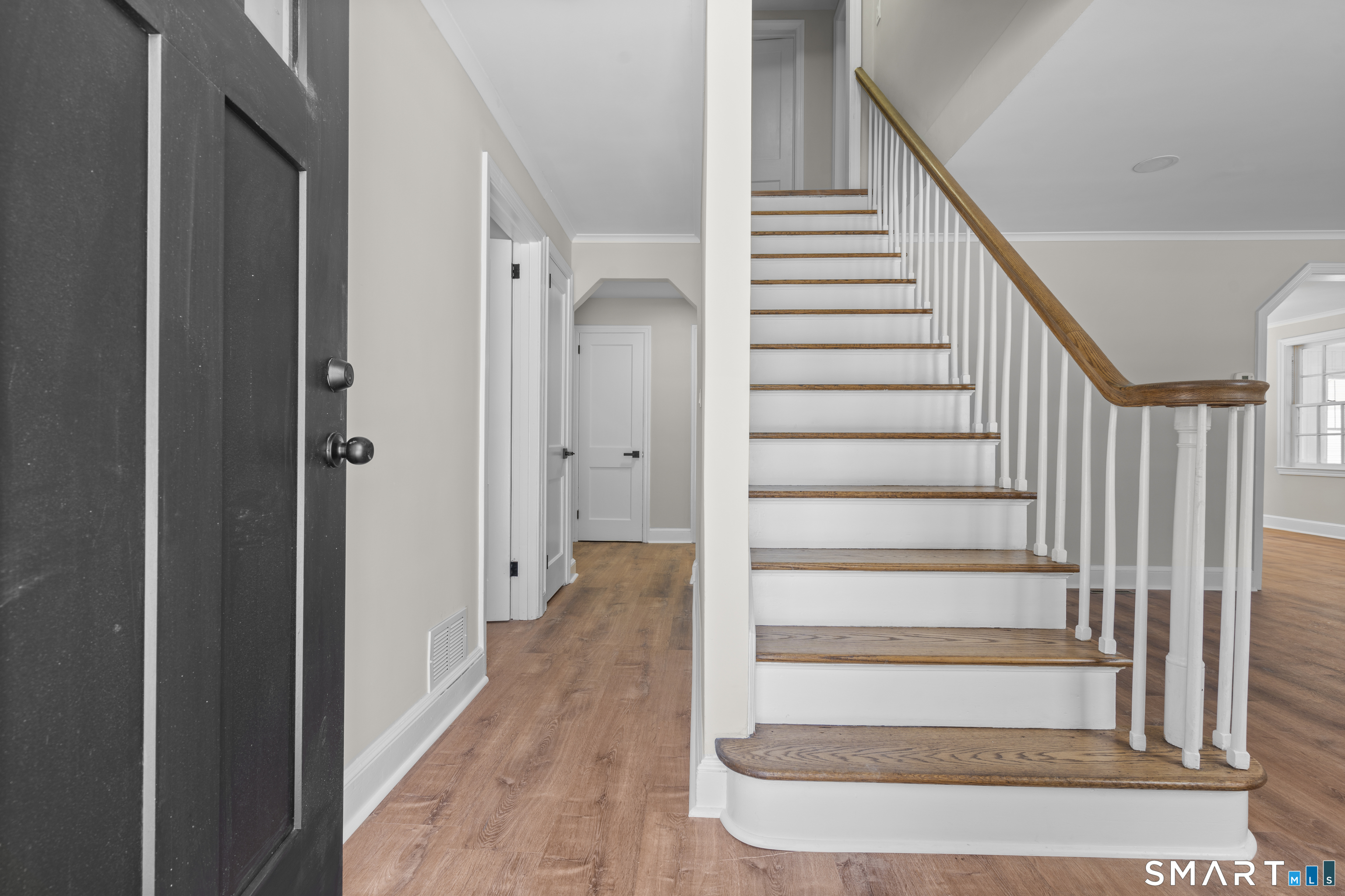 608 Kennedy Road Windsor, CT 06095 - Photo 2 of 39 a view of entryway with wooden floor and stairs