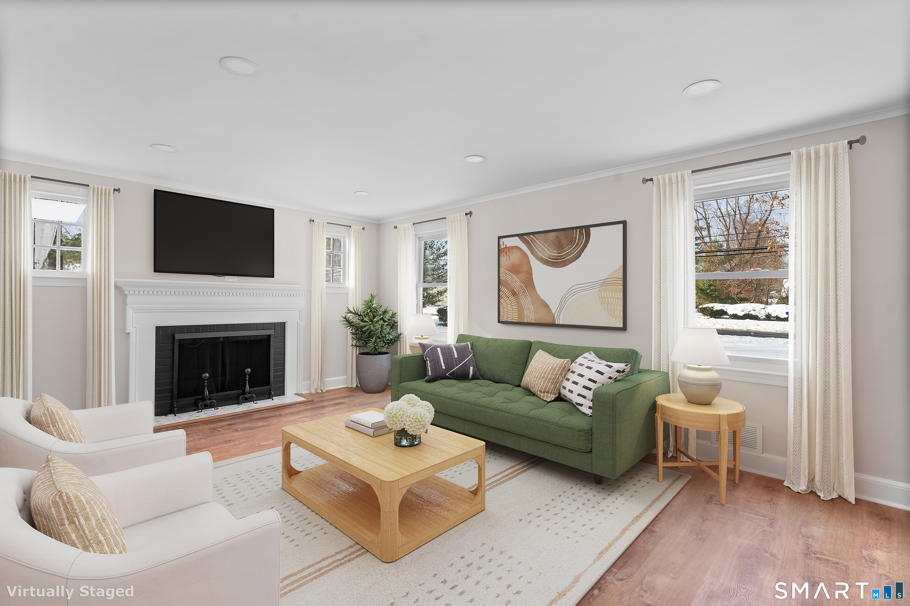 608 Kennedy Road Windsor, CT 06095 - Photo 3 of 39 a living room with furniture a flat screen tv and a fireplace