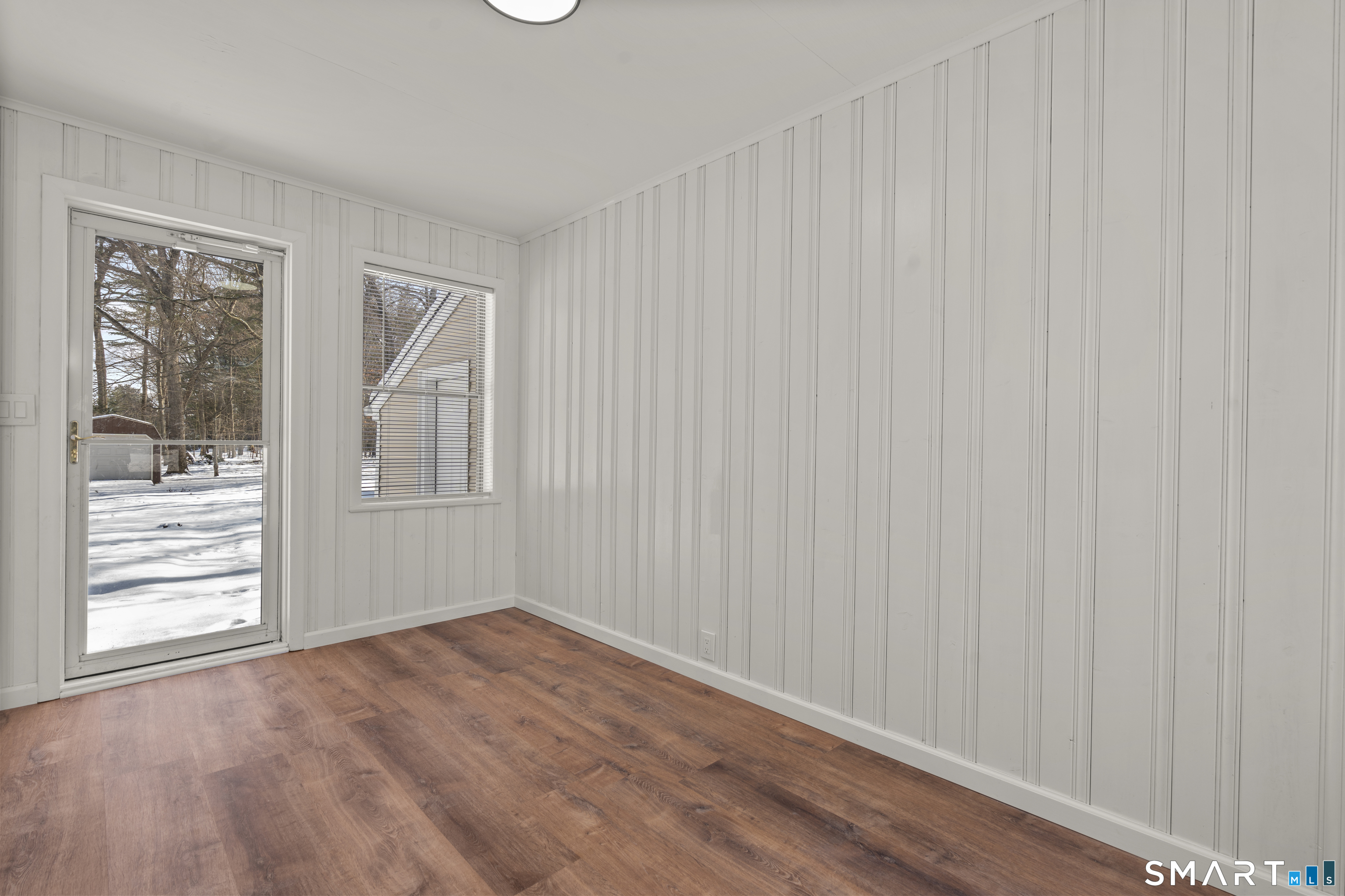 608 Kennedy Road Windsor, CT 06095 - Photo 31 of 39 a view of empty room with wooden floor and fan