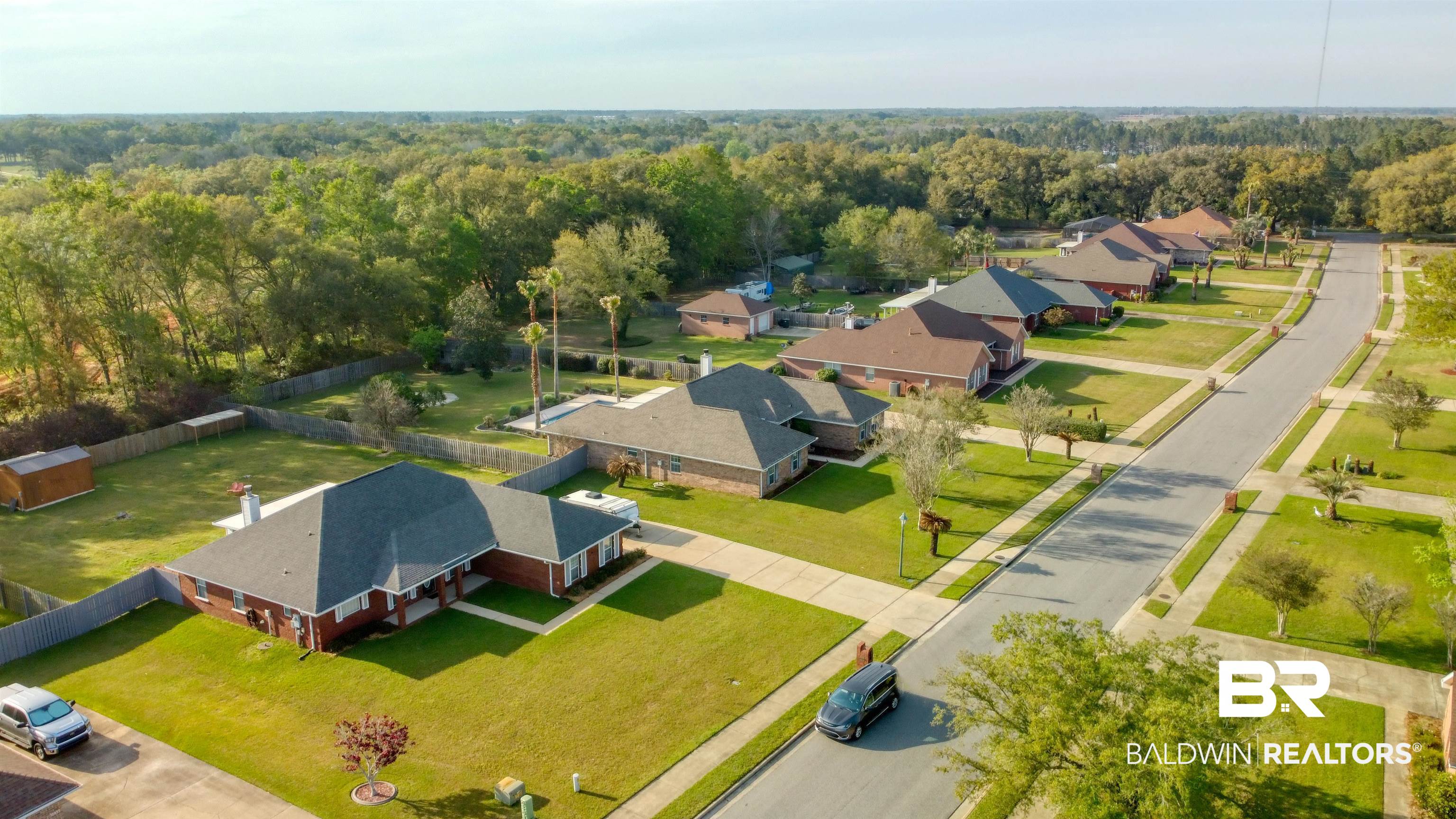 12893 Hunters Chase Foley, AL 36535 - Photo 5 of 42 Aerial view with a residential view and a view of trees