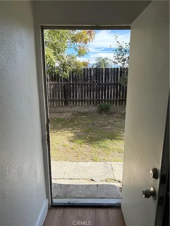 a view of swimming pool from a window