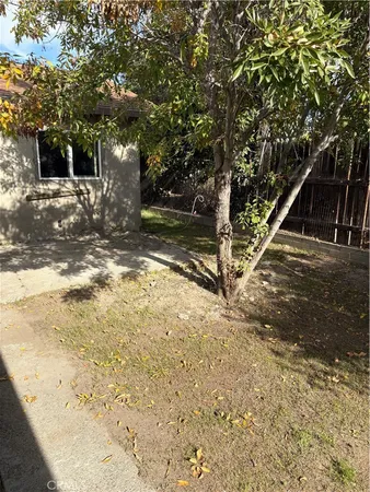 a view of a swimming pool with a house