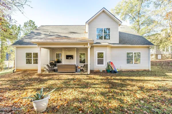 a kitchen with stainless steel appliances granite countertop a stove a microwave and cabinets