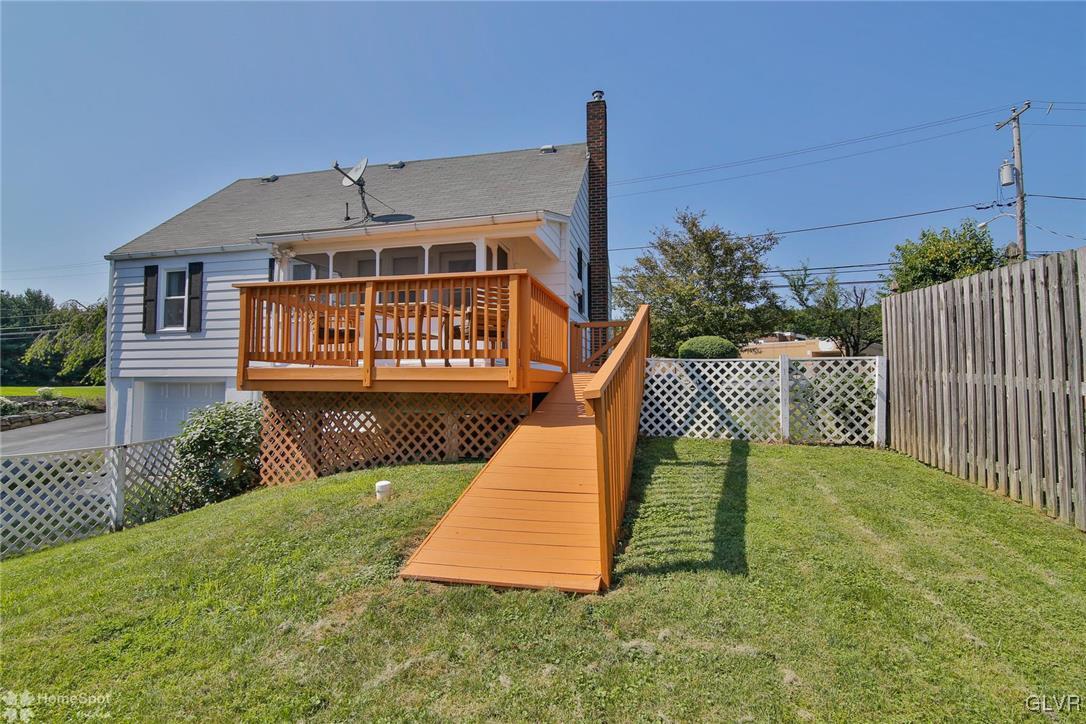 538 School Road Nazareth, PA 18064 - Photo 27 of 29 a front view of a house with a yard table and chairs