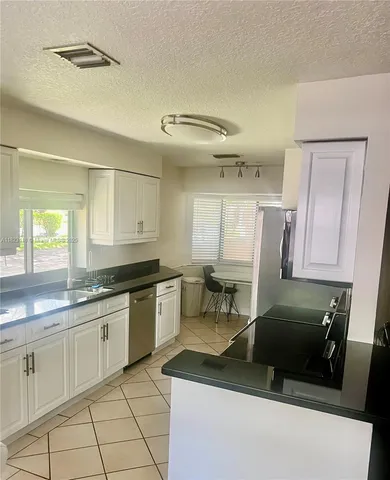 $475,000 | 9211 Chelsea Drive North, Plantation, FL 33324