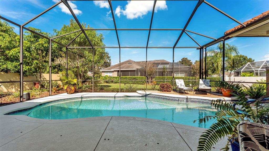 237 McLean Point Winter Haven, FL 33884 - Photo 12 of 85 a view of a swimming pool with a patio