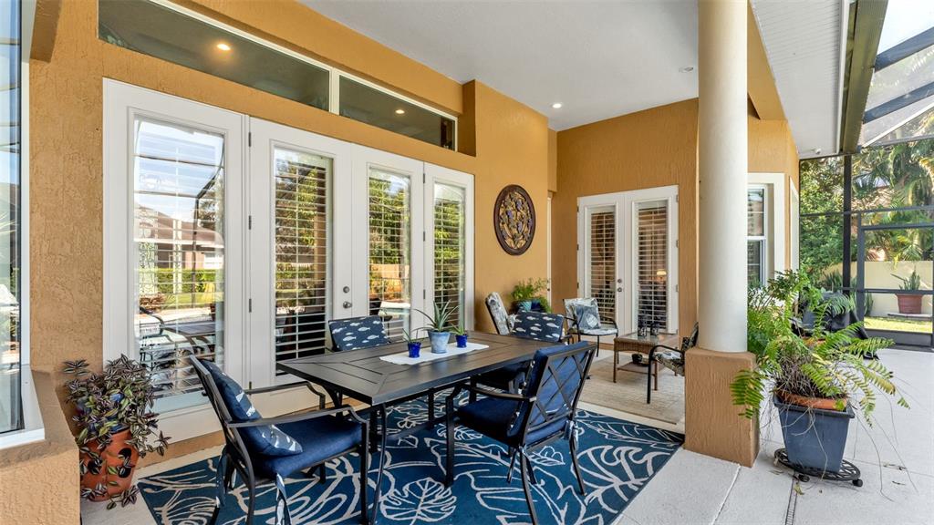 237 McLean Point Winter Haven, FL 33884 - Photo 13 of 85 a view of a dining room with furniture and window in the patio