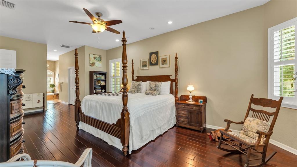 237 McLean Point Winter Haven, FL 33884 - Photo 24 of 85 a bed room with a bed and a chair