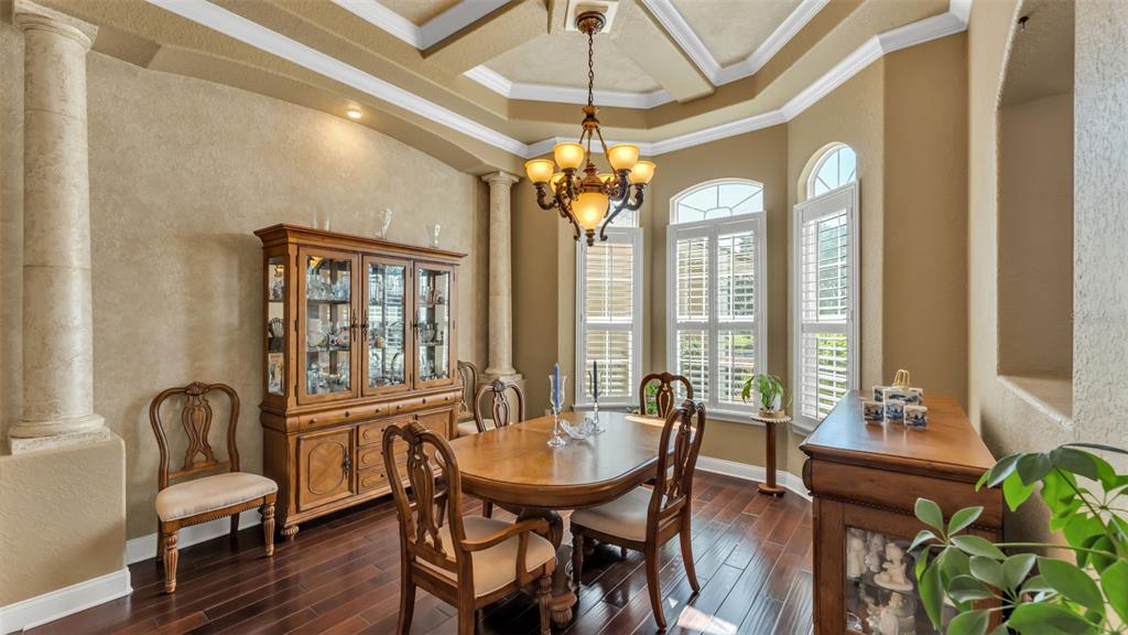 237 McLean Point Winter Haven, FL 33884 - Photo 58 of 85 a view of a dining room with furniture window and wooden floor