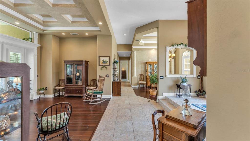 237 McLean Point Winter Haven, FL 33884 - Photo 59 of 85 a living room with furniture and a clock