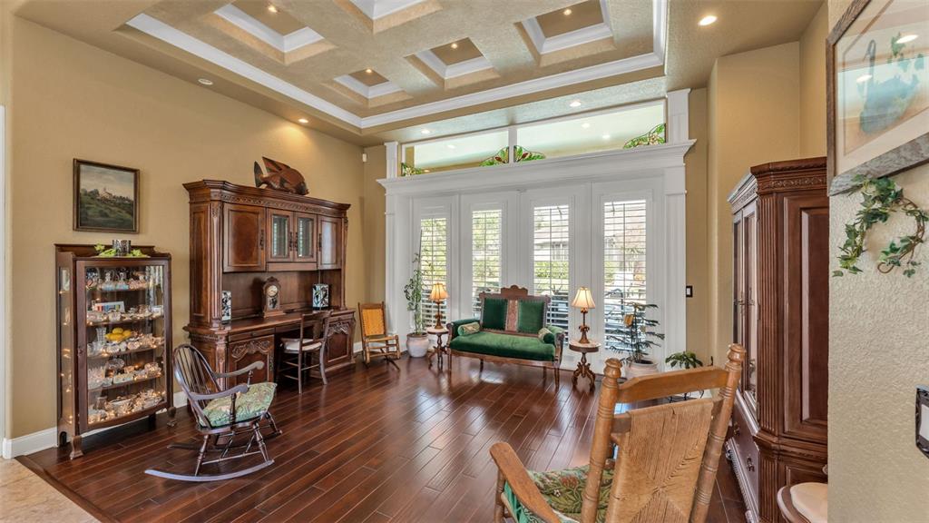 237 McLean Point Winter Haven, FL 33884 - Photo 61 of 85 a living room with furniture a rug and a large window