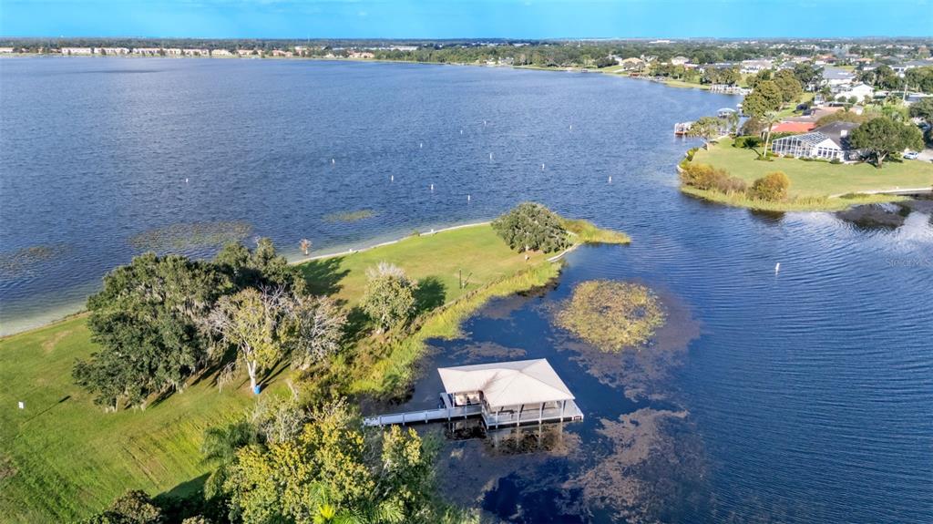 237 McLean Point Winter Haven, FL 33884 - Photo 69 of 85 an aerial view of a house with a swimming pool