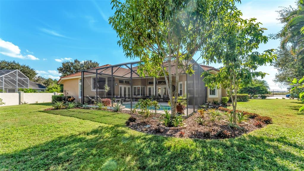 237 McLean Point Winter Haven, FL 33884 - Photo 7 of 85 a view of a house with a yard and sitting area