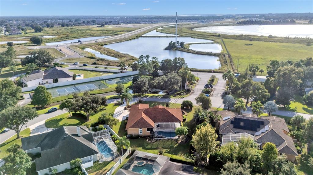 237 McLean Point Winter Haven, FL 33884 - Photo 78 of 85 an aerial view of residential houses with outdoor space and lake view