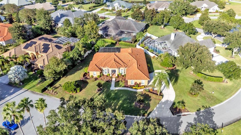 237 McLean Point Winter Haven, FL 33884 - Photo 83 of 85 an aerial view of residential house with outdoor space and swimming pool