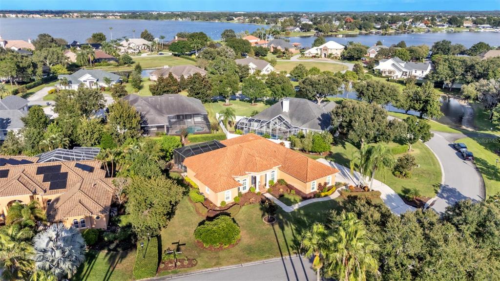 237 McLean Point Winter Haven, FL 33884 - Photo 84 of 85 an aerial view of a house with yard swimming pool and outdoor seating