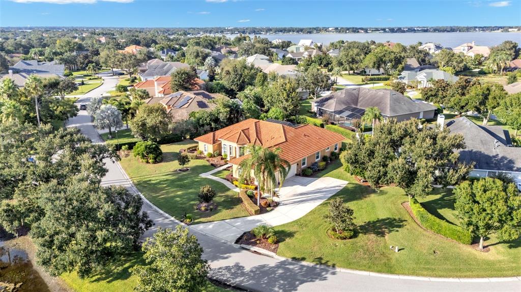 237 McLean Point Winter Haven, FL 33884 - Photo 85 of 85 an aerial view of residential houses with outdoor space