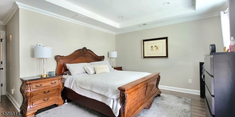 6 Elm Street, Unit 5 Madison, NJ 07940 - Photo 12 of 18 a bed room with a bed and a night stand