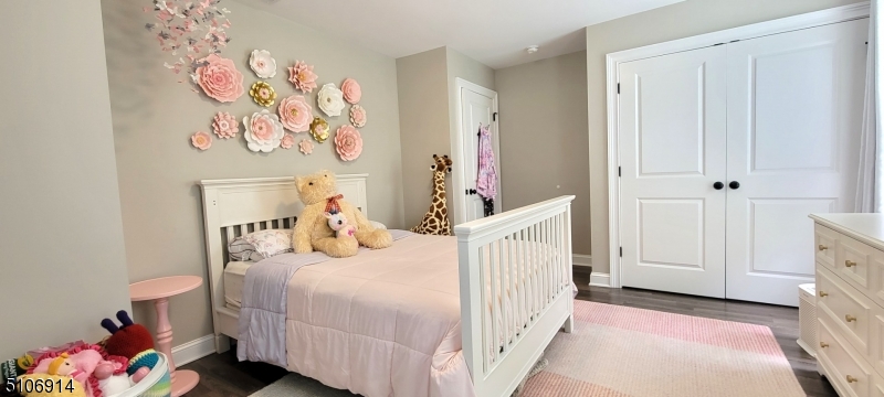 6 Elm Street, Unit 5 Madison, NJ 07940 - Photo 15 of 18 a bedroom with a bed and a window