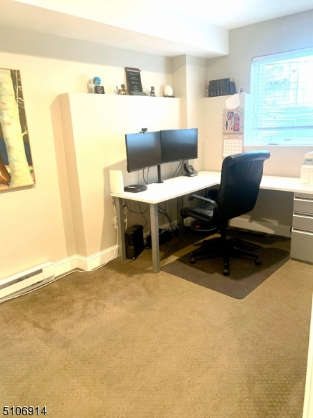 6 Elm Street, Unit 5 Madison, NJ 07940 - Photo 17 of 18 a living room with furniture and a table