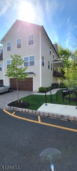 6 Elm Street, Unit 5 Madison, NJ 07940 - Photo 2 of 18 a front view of house with yard and green space
