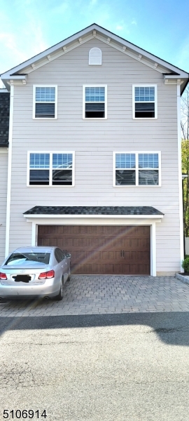 6 Elm Street, Unit 5 Madison, NJ 07940 - Photo 3 of 18 a front view of a house with a space