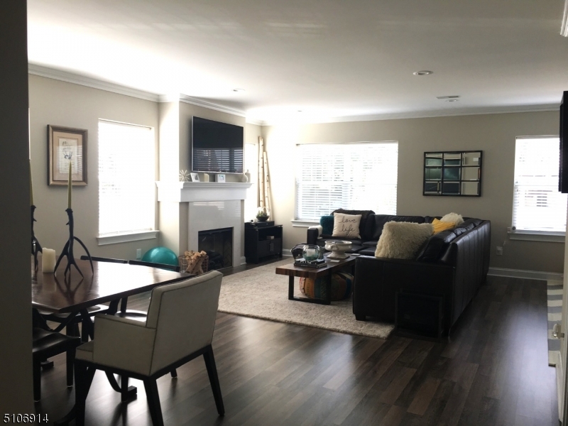 6 Elm Street, Unit 5 Madison, NJ 07940 - Photo 9 of 18 a living room with fireplace furniture and a window