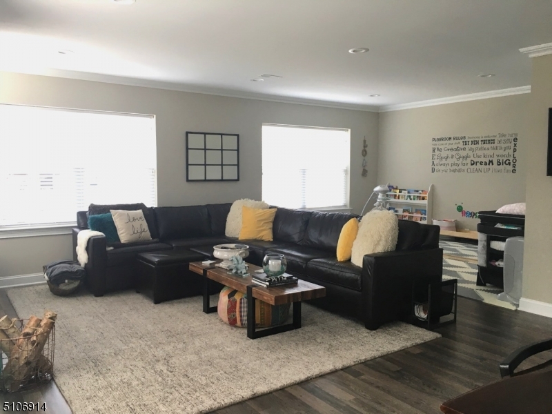 6 Elm Street, Unit 5 Madison, NJ 07940 - Photo 10 of 18 a living room with furniture and wooden floor