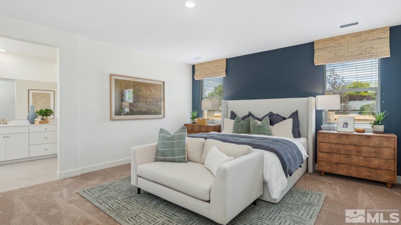 10604 Claim Jumper Way, Unit HOMESITE 43 Reno, NV 89521 - Photo 5 of 5 a bedroom with a bed and a couch